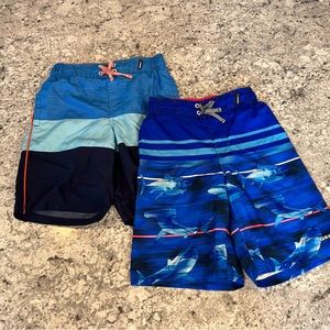 2 boys swim trunks size medium (10/12)